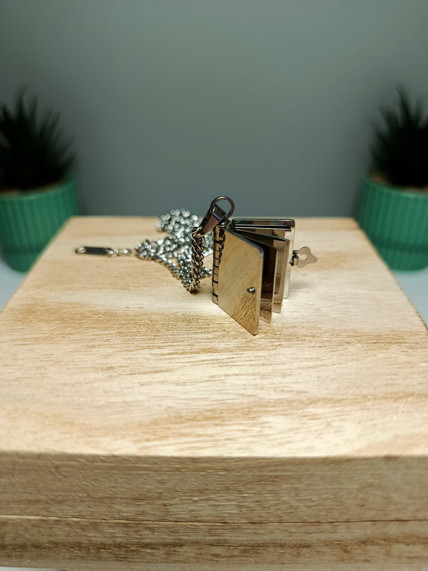 Colgante librito acero inoxidable