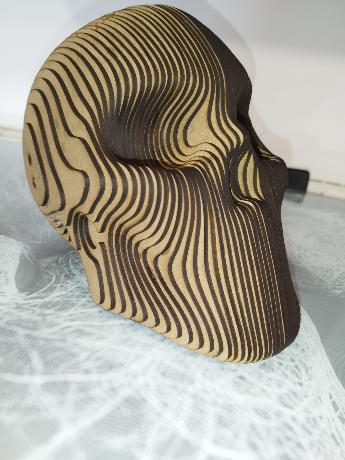 Cabeza de calavera laminada