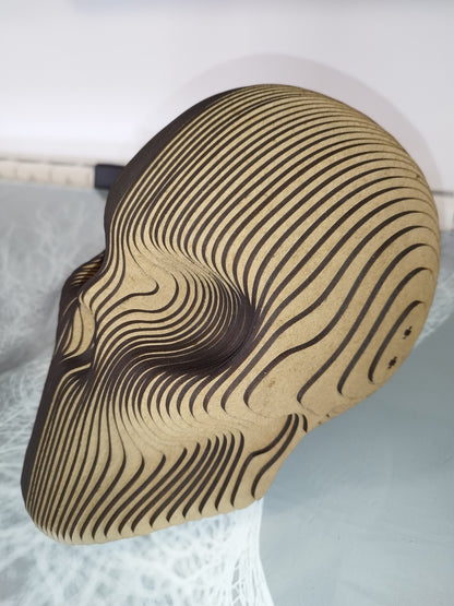 Cabeza de calavera laminada