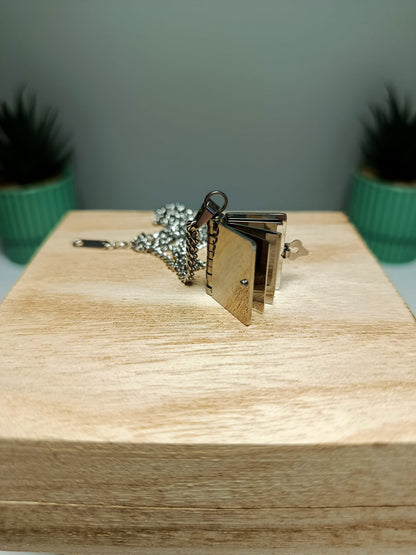 Colgante librito acero inoxidable