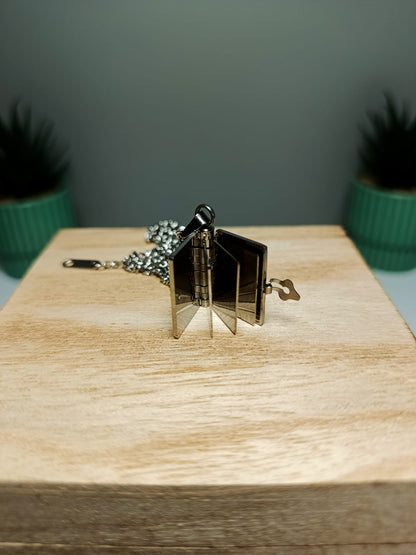 Colgante librito acero inoxidable